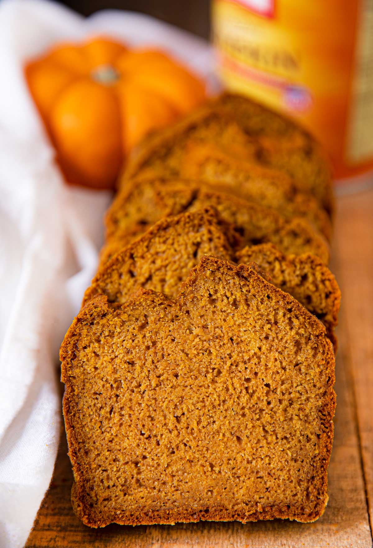 Pumpkin Bread Loaf Recipe cut into slices on board